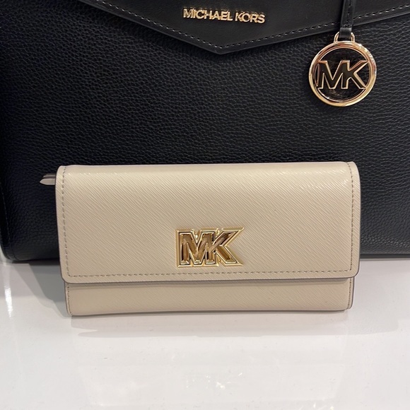 Michael Kors Handbags - Michael Kors Mimi Large Saffiano Leather Bi-Fold Continental Wallet
Light Sand